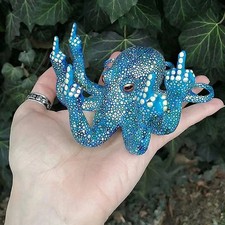 Mittelfinger Oktopus Statue