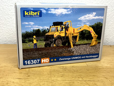 Kibri 16307 - H0 Zweiwege UNIMOG mit Heckbagger Bausatz 1:87