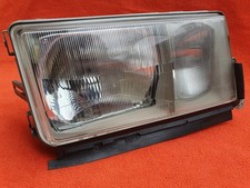 Mercedes Benz W201 190er Frontscheinwerfer rechts Hella 127 092-00 RE