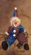 Clown auf Schaukel