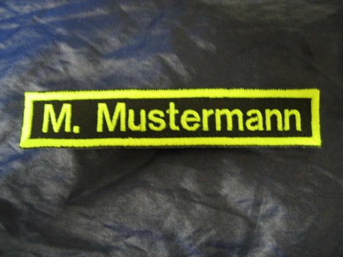 Namensschild schwarz neongelb