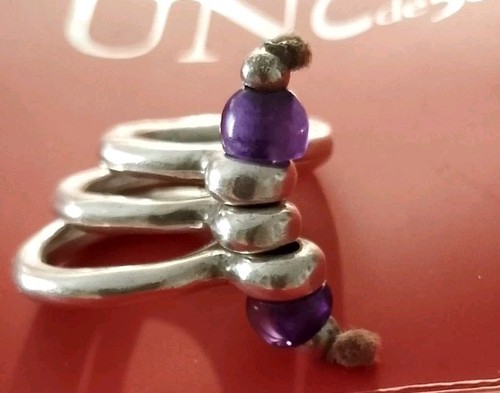Uno anillo triple - uno,