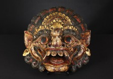 A vintage Balinese wooden mask