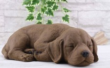 Steinfigur Hund schlafend