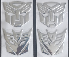 4x 3D PVC Auto Aufkleber Sticker Emblem Chrom Maske – 7x7cm Transformers Design