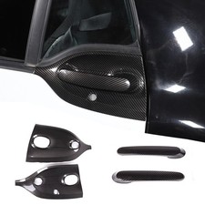 Carbon look door handle trim