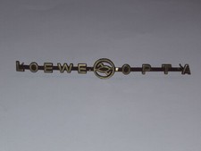 Emblem "Loewe Opta" aus Loewe Opta Bella-modern 6728W - Röhrenradio Ersatzteil