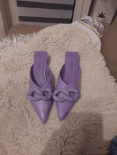 Extravagante Slipper Schuhe