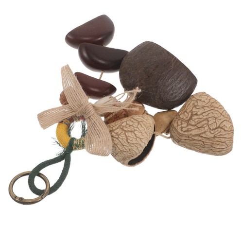 Handrassel aus nussschalen - handrassel,