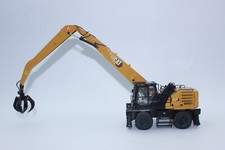 Diecast Masters 85958 Cat Caterpillar  MH 3040 Umschlagbagger  1:50 NEU in OVP