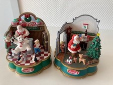 Zwei Coca-Cola Spieluhren