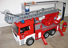 Bruder MAN TGA Feuerwehr LKW mit Drehleiter+Wasserpumpe+Schlauch + Light & Sound