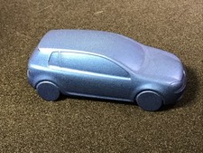 Briefbeschwerer Flaschenöffner Voll-Metall 400g, PKW VW Golf