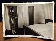 Woman in Bedroom with Wardrobe