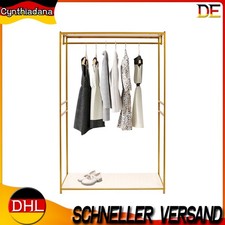 Goldene Metall-Kleidung