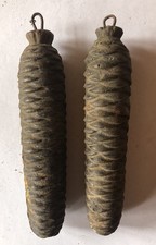 2 alte Uhrengewichte