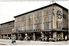 AK Dortmund im Ruhrgebiet - Hauptbahnhof - farbig, Geschäfte, ca. 1960