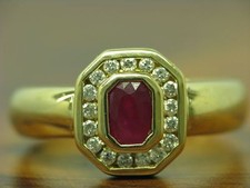 18kt 750 Gelbgold Ring mit 0,18ct Brillant & 0,80ct Rubin Besatz / RG58
