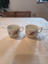 2 einzelne antike Kaffeetassen