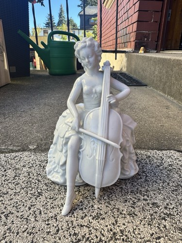Porzellanfigur cellistin - porzellanfigur,