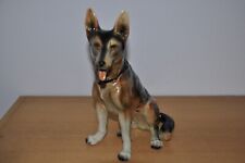 Porzellanfigur "Sitzender Schäferhund"