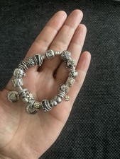 Pandora Armband 17cm mit bicolor Charms