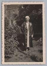 Woman in Leather Coat -