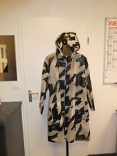 Rundholz Regenmantel
