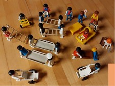 Playmobil-Figuren mit Leitern