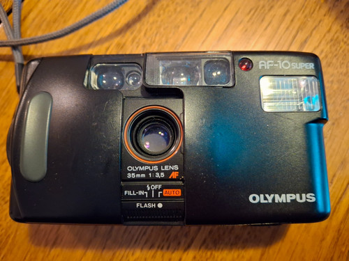 Olympus super - af-10,