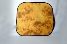 Falthintergrund von Lastolite, Sand/Gelb-Rot, kaum benutzt.