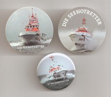 Drei Verschiedene Anstecker