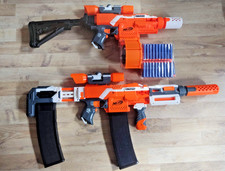 2x Nerf Stryfe orange - zahlreiche Anbauteile / Mods + Magazine + 150 neue Darts