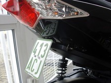 Kennzeichenhalter mittig