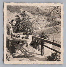 Mann mit Fotokamera &