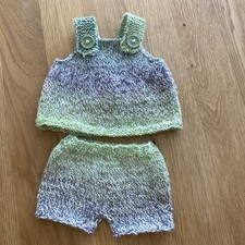 Handgestrickte Kleidung f
