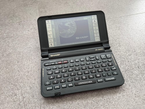 Sharp 5000g pda pocket - sharp,