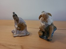 2x chinesische Figuren,beschädigt