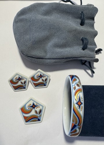 Set aus armreif und brosche - set,