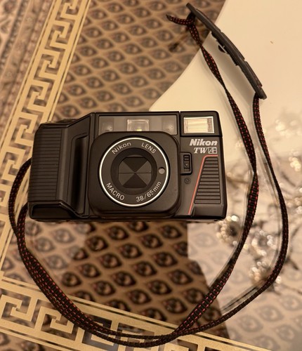 Nikon l35 - tw,