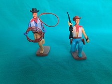 PLASTY  2 Cowboy einer mit Lasso und einer mit Gewehr und Pistole