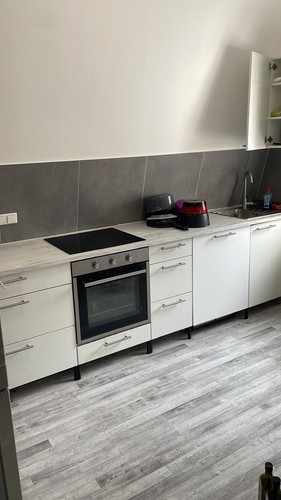 Kitchen furniture with stove