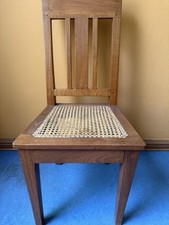 Rette mich: Solider Teakholzstuhl mit Bastgefechtfehler