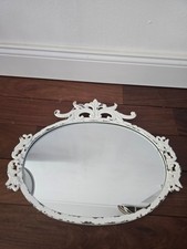 Wandspiegel oval mit Dekor