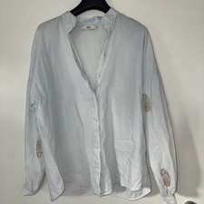  Hellblaue Bluse mit