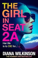 The Girl in Seat 2A: THE