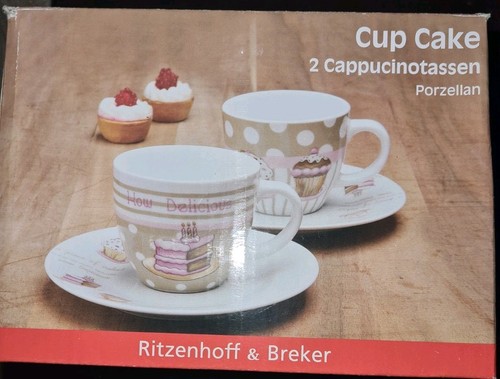 Zwei hübsche kaffeetassen mit - zwei,