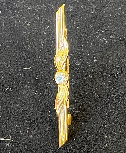 Goldfarbene stabbrosche aus - goldfarbene,