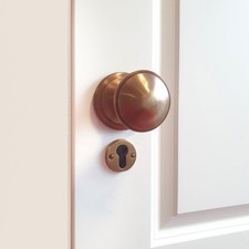 Türbeschlag mit Knauf für Haustüren - feststehend | PZ | Messing patiniert