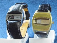 2x Scheibenuhr, Jump Hour